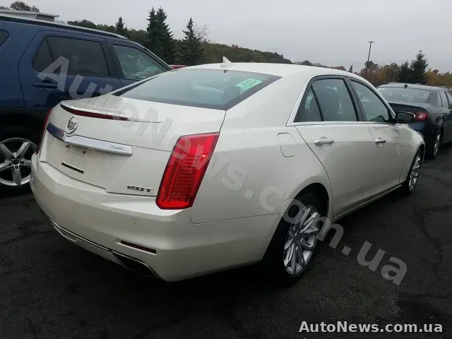 2013 Cadillac CTS Sedan, VIN 1G6AW5SX2E0120452, plate КА2869ММ — photo 2 (manheim)