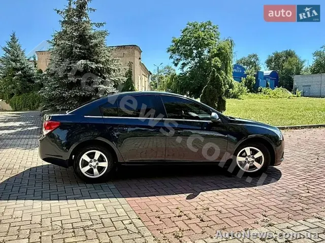2016 Chevrolet Cruze, VIN 1G1PE5SB0G7205758 — zdjęcie 11 (autoria)