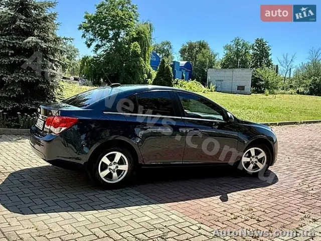 2016 Chevrolet Cruze, VIN 1G1PE5SB0G7205758 — zdjęcie 12 (autoria)