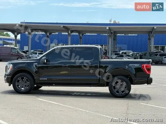 2023 Ford F-150, VIN 1FTFW1ED0PFC74848 — фото 2 (autoria)